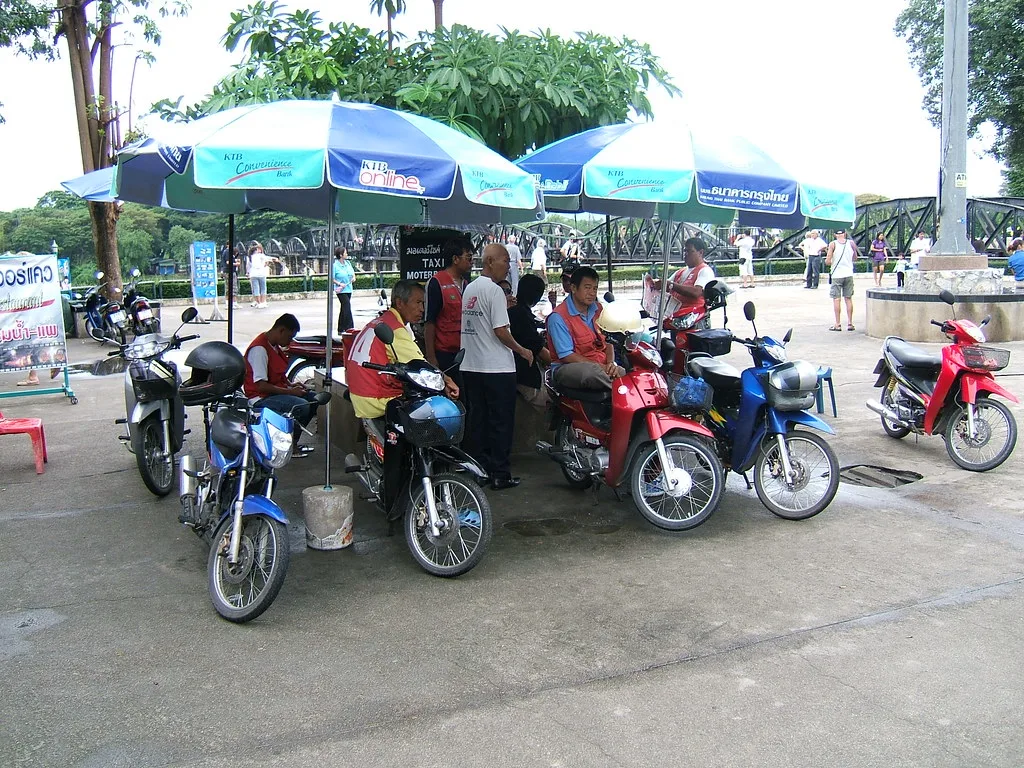 Photo: Motor-sais or motorcycle taxis wait for passengers outside the JEATH war museum